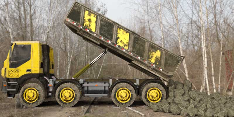 Dumper truck dropping stones